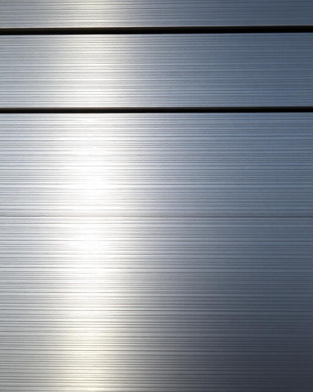 Folded aluminium profiles and trims stacked in the workshop